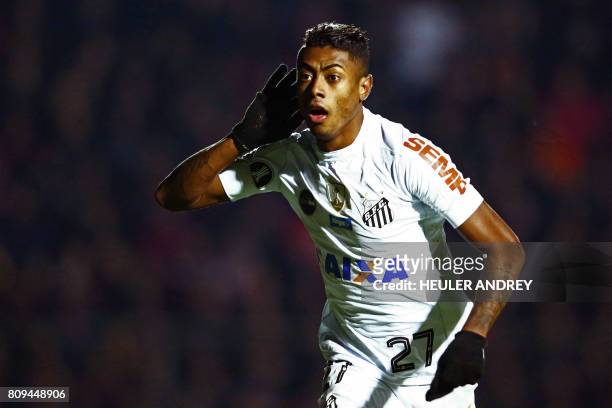 Bruno Henrique, of Brazil's Santos celebrates after scoring against Brazil's Atletico Paranaense during their 2017 Libertadores Cup football match at...