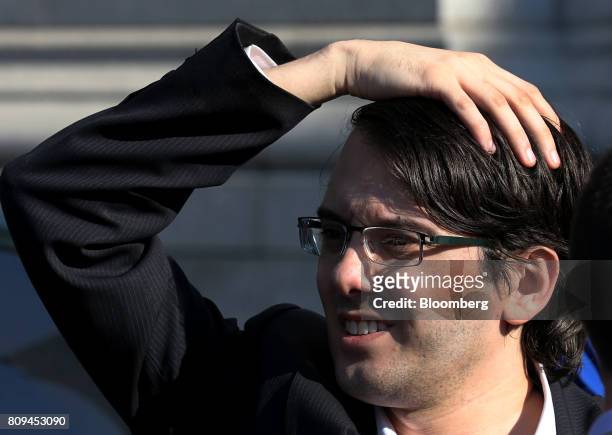 Martin Shkreli, former chief executive officer of Turing Pharmaceuticals AG, exits federal court in the Brooklyn borough of New York, U.S., on...