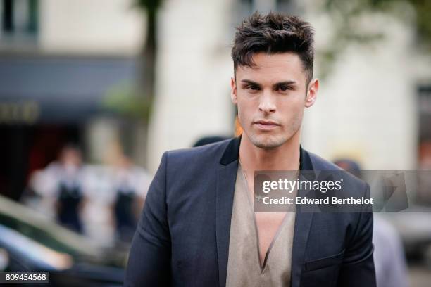 Baptiste Giabiconi is seen, outside the Fendi show, during Paris Fashion Week - Haute Couture Fall/Winter 2017-2018, on July 5, 2017 in Paris, France.