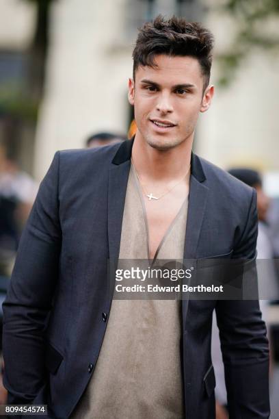 Baptiste Giabiconi is seen, outside the Fendi show, during Paris Fashion Week - Haute Couture Fall/Winter 2017-2018, on July 5, 2017 in Paris, France.