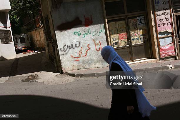 Druze woman walks the street, on April 29, 2008 in Majdal Shams in the Golan Heights. Residents of this strategic volcanic plateau, which Israel...