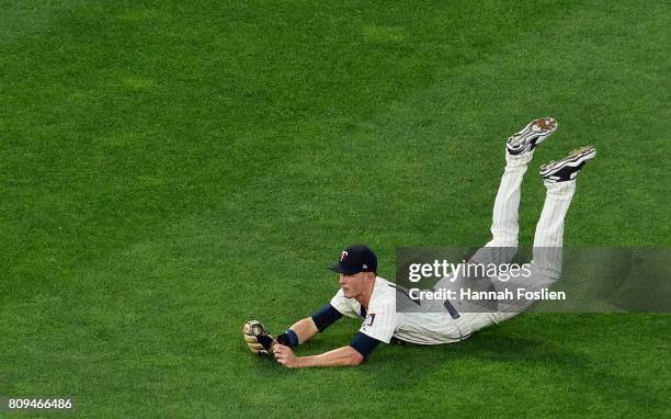 Max Kepler of the Minnesota Twins makes a catch in right field of the ball hit by Albert Pujols of the Los Angeles Angels of Anaheim during the sixth...