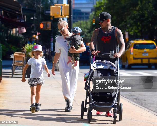 Pink and Carey Hart, with children Willow Hart and Jameson Hart, step out for a walk to the park on July 5, 2017 in New York City.