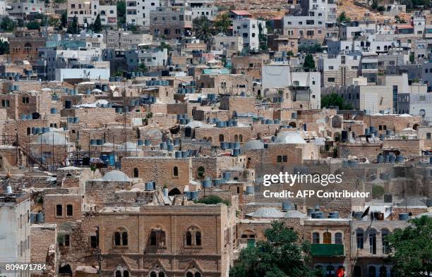 Picture taken on June 29, 2017 shows a view of the houses in the old town of the divided city of Hebron in the southern West Bank. On July 7, 2017...