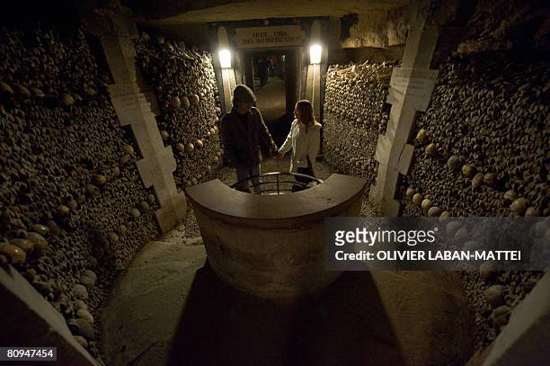 Les Catacombes de Paris rouvrent au public apr?s restauration ". People visit on April 30, 2008 the official section of Paris' catacombs. These...