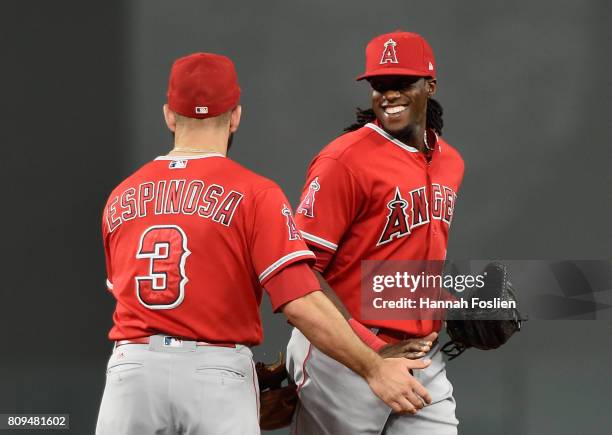 Danny Espinosa and Cameron Maybin of the Los Angeles Angels of Anaheim celebrate winning the game against the Minnesota Twins on July 5, 2017 at...