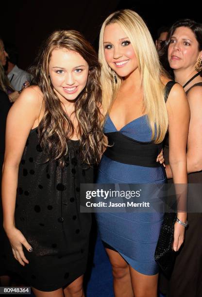 Actress Miley Cyrus and Amanda Bynes attends the Us Weekly 2007 Hot Hollywood party at Opera on September 26, 2007 in Los Angeles, California.