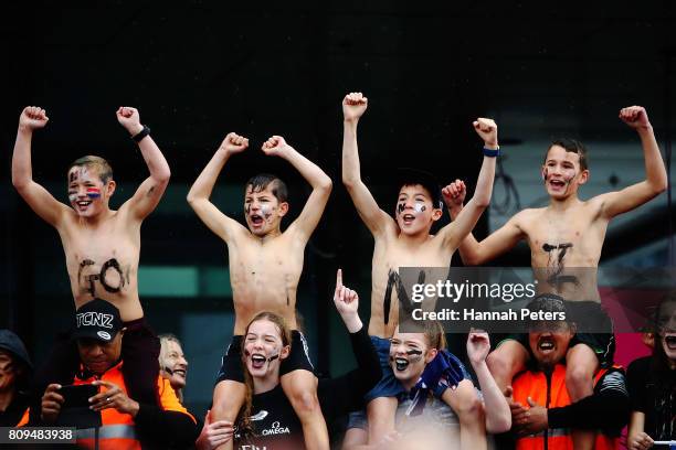 Team New Zealand fans show their support during the Team New Zealand Americas Cup Welcome Home Parade on July 6, 2017 in Auckland, New Zealand.