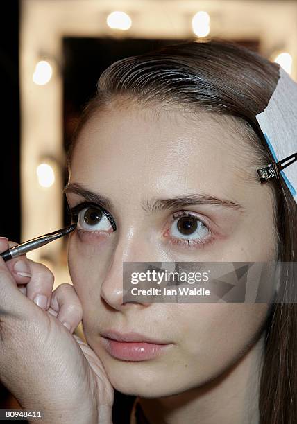 Model has make-up applied backstage prior to the Shakuhachi show during the fourth day of the Rosemount Australian Fashion Week Spring/Summer 2008/09...