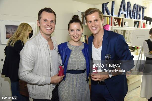 Malte Arkona, his wife Anna-Maria Arkona and Lukas Sauer attend the Klambt Fashion Cocktail in Berlin at Soho House on July 5, 2017 in Berlin,...