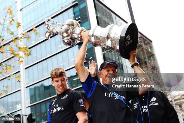 Peter Burling and Grant Dalton celebrate with the Americas Cup during the Team New Zealand Americas Cup Welcome Home Parade on July 6, 2017 in...