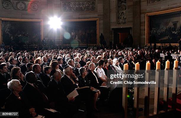 Menorah stands under the Rotunda as people sit during the Days of Remembrance Program in the U.S. Capitol May 1, 2008 in Washington, DC. Organized by...