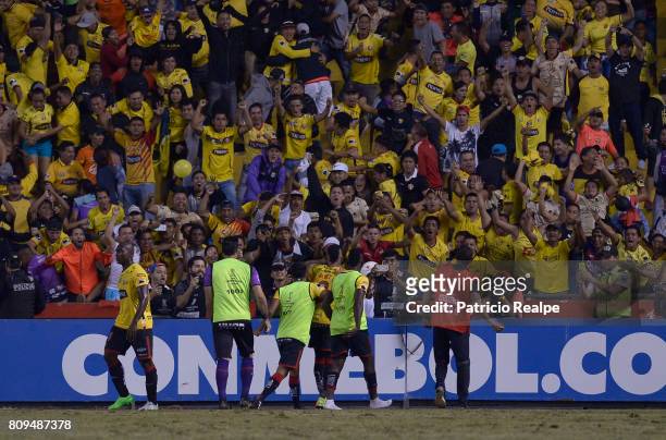 Jonatan Alves of Barcelona SC celebrates with teammates and fans after scoring the first goal of his team during a first leg match between Barcelona...