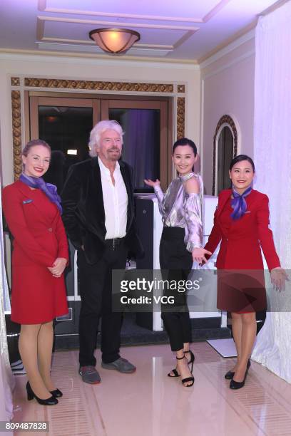 Richard Branson and actress Fala Chen attend Virgin Australia new route event on July 5, 2017 in Hong Kong, China.