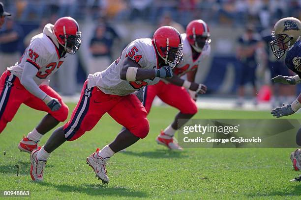 Defensive lineman Dwight Freeney of the Syracuse University Orange pursues the play during a college football game against the University of...