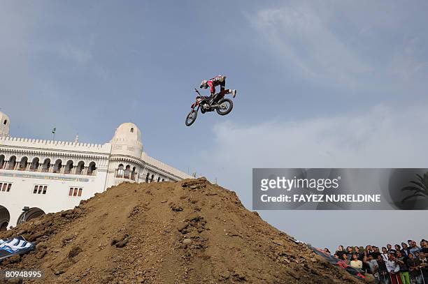 Member of a profesional French motorcyclist group performs during a Free Style Moto Cross show organized on May 1, 2008 in downtown Algiers. The show...