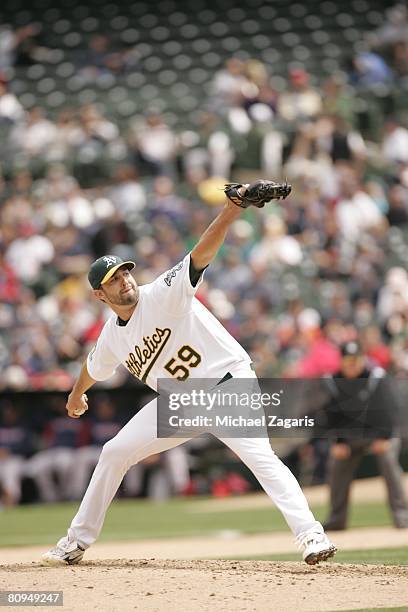 Andrew Brown of the Oakland Athletics pitches during the game against the Boston Red Sox at the McAfee Coliseum in Oakland, California on April 2,...