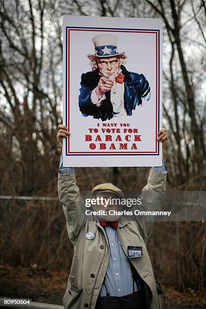 Supporter of Democratic U.S. Presidential hopeful Sen. Barack Obama shows his support of the candidate during a town hall meeting at Dunmore...