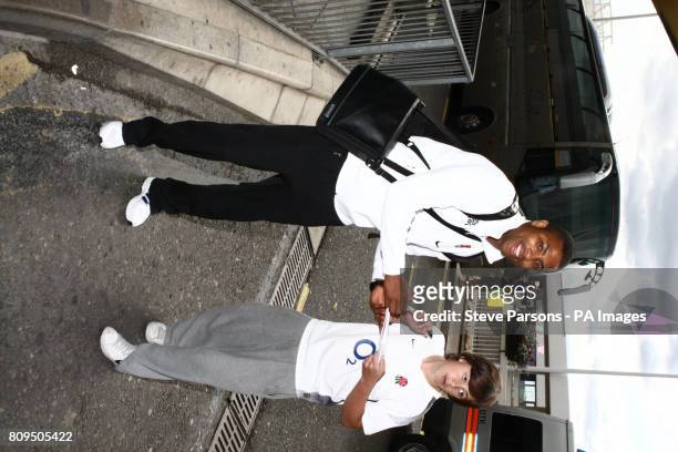 England Rugby team's Delon Armitage signs autographs at Terminal 1 at Heathrow Airport, London.
