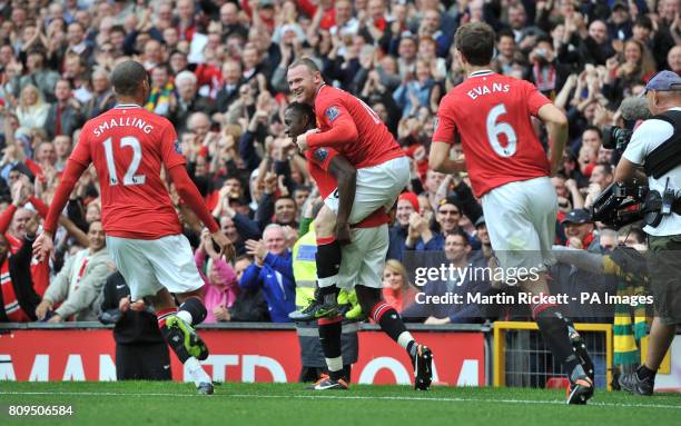 Manchester United's Danny Welbeck celebrates the first goal of the game with Wayne Rooney, Chris Smalling and Jonathan Evans during the Barclays...