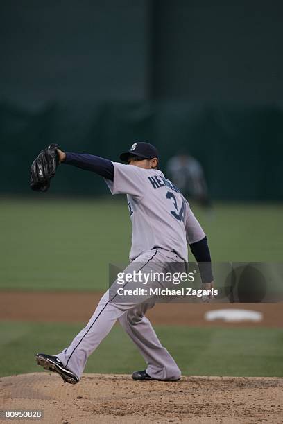 Felix Hernandez of the Seattle Mariners pitches during the game against the Oakland Athletics at the McAfee Coliseum in Oakland, California on April...