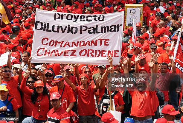 Supporters of Venezuelan President Hugo Chavez demonstrate during May Day in Caracas on May 1, 2008. AFP PHOTO/Miguel Gutierrez