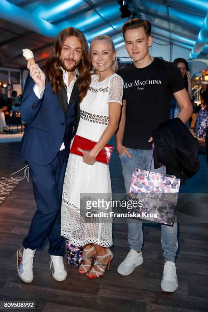Riccardo Simonetti, Jenny Elvers and her son Paul Jolig attend the Guido Maria Kretschmer Fashion Show Autumn/Winter 2017 presented by OTTO at...