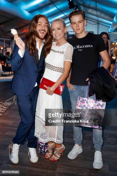 Riccardo Simonetti, Jenny Elvers and her son Paul Jolig attend the Guido Maria Kretschmer Fashion Show Autumn/Winter 2017 presented by OTTO at...