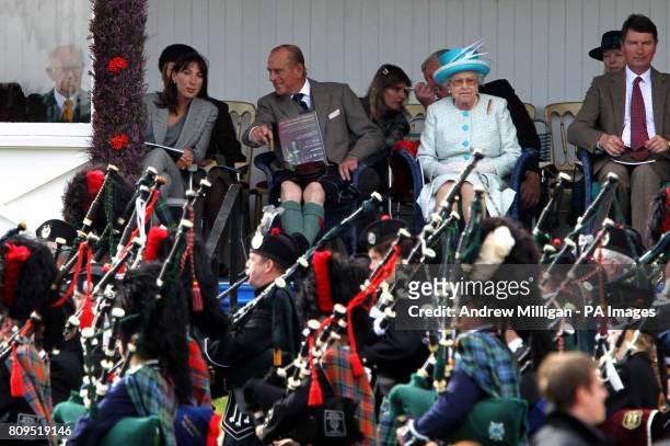 Samantha Cameron the Duke of Edinburgh, Queen Elizabeth II and Timothy Lawerence watch proceedings at the Braemar Gathering in Braemar.