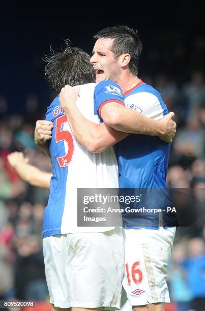 Blackburn Rovers' Gael Givet and Scott Dann celebrate victory after the final whistle