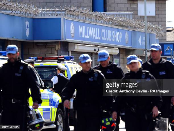Police presence outside the New Den as Millwall FC play West Ham United, London