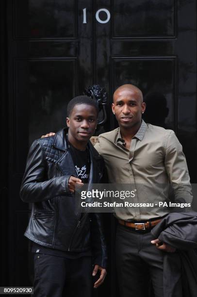 Recording artist Tinchy Stryder and footballer Jermain Defoe arrive at 10 Downing Street for a reception hosted by the Prime Minister to celebrate...