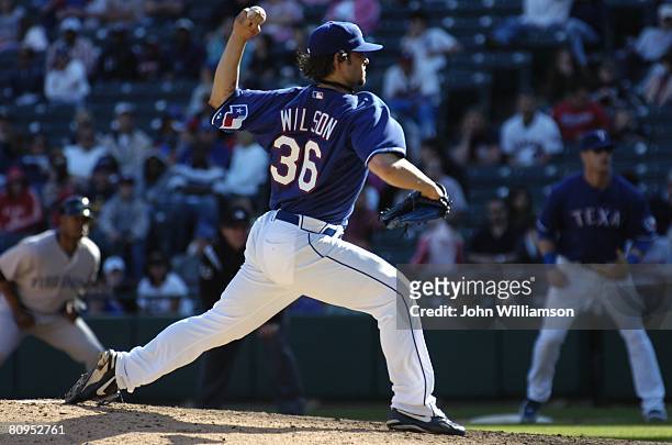 Wilson of the Texas Rangers pitches during the game against the Toronto Blue Jays at Rangers Ballpark in Arlington in Arlington, Texas on April 13,...