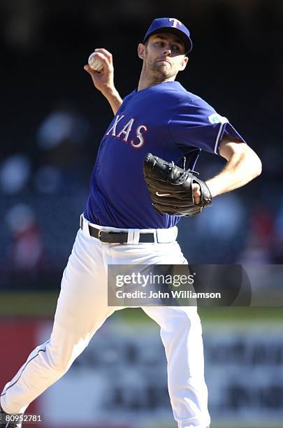 Dustin Nippert of the Texas Rangers pitches during the game against the Toronto Blue Jays at Rangers Ballpark in Arlington in Arlington, Texas on...