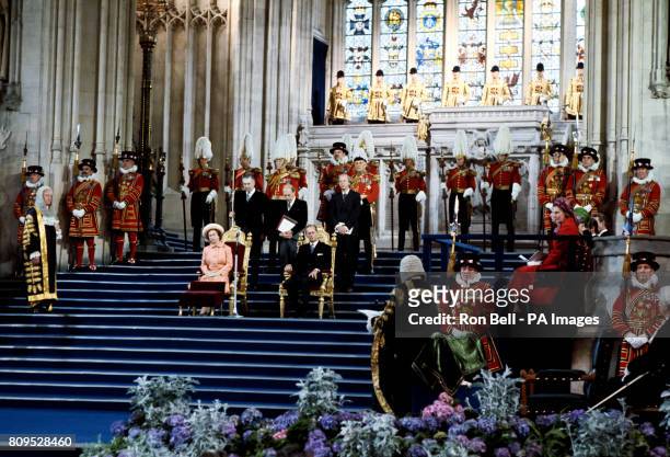 The Duke of Edinburgh seated alongside Queen Elizabeth II as she receives loyal addresses from both Houses of Parliament in Westminster Hall, London,...