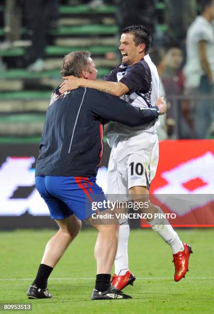 Glasgow Rangers' Spanish forward Nacho Novo celebrates after scoring the last penalty against Fiorentina during their UEFA Cup semi-final 2nd leg...