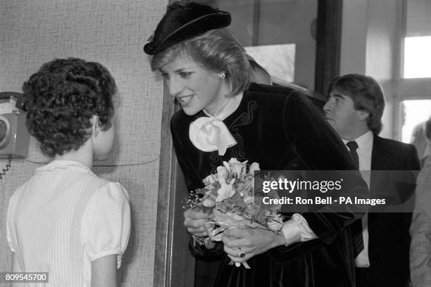 Diana, Princess of Wales visits the Royal Marsden Hospital in Sutton. She was presented with a bouquet on her arrival from former patient, nine year...