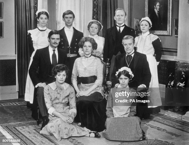 The cast of the British drama television series "Upstairs, Downstairs", back row, left to right, Jean Marsh, Christopher Beeny, Angela Baddeley,...