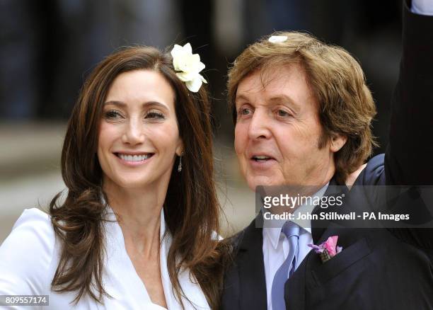 Sir Paul McCartney and Nancy Shevell leave Westminster Registry Office in north London after they got married.