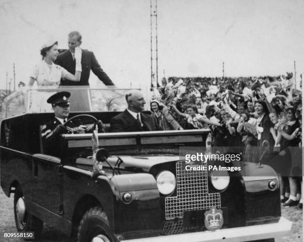 **Scanned from contact low-res** Queen Elizabeth II and the Duke of Edinburgh in an open top Land Rover in Newcastle, Australia.
