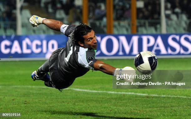 Italy's Gianluigi Buffon saves a header from Northern Ireland's Ryan McGivern during UEFA Euro 2012 Qualifying match at the Stadio Adriatico,...