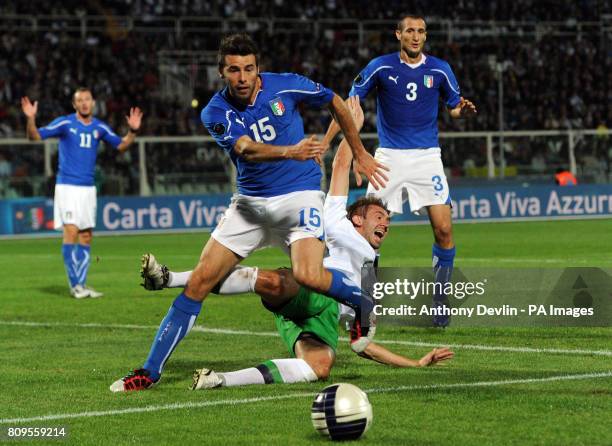 Northern Ireland's Gareth McAuley appeals after being brought down in the penalty area during UEFA Euro 2012 Qualifying match at the Stadio...