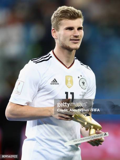 Timo Werner of Germany poses with the adidas Golden Boot award after the FIFA Confederations Cup Russia 2017 final between Chile and Germany at Saint...