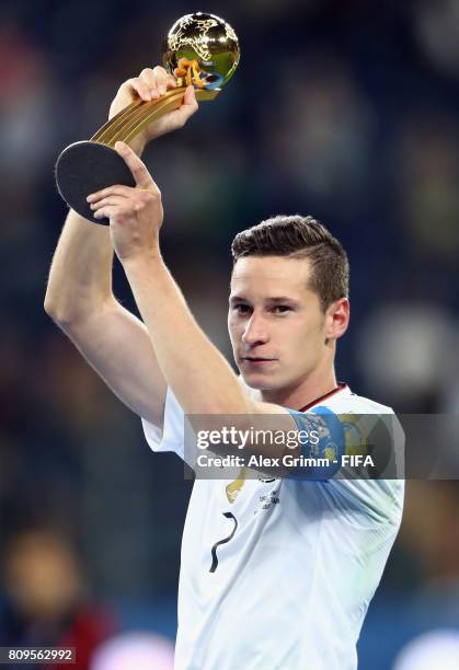 Julian Draxler of Germany poses with the adidas Golden Ball award after the FIFA Confederations Cup Russia 2017 final between Chile and Germany at...