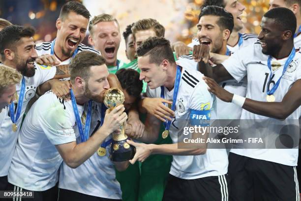 Shkodran Mustafi, Julian Draxler and team mates of Germany celebrate with the trophy after the FIFA Confederations Cup Russia 2017 final between...