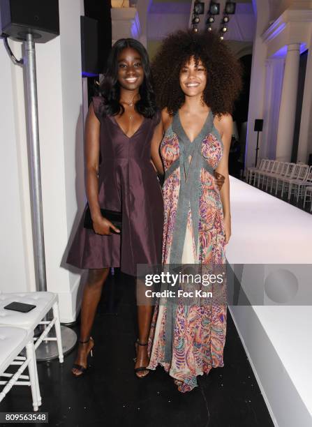 Karidja Toure and Tina Kunakey attends the Jean Paul Gaultier Haute Couture Fall/Winter 2017-2018 show as part of Haute Couture Paris Fashion Week on...