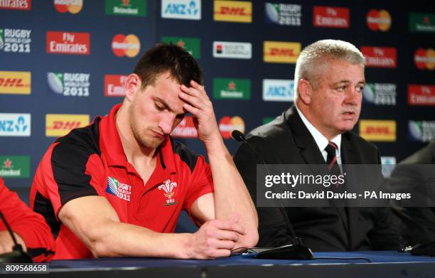 Wales' Sam Warburton and coach Warren Gatland during the post match press conference after IRB World Cup Semi Final at Eden Park, Auckland, New...