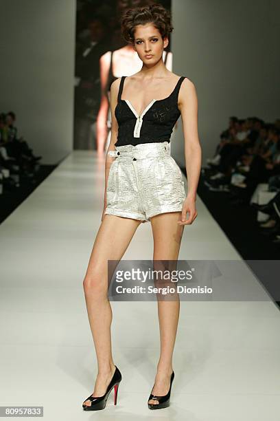 Model showcases an outift by designer Miischa as part of the New Generation catwalk show during the fifth day of the Rosemount Australian Fashion...