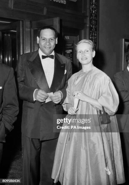 Latin-American band-leader, Edmundo Ros, with his wife Britt Johansen, attend the premiere of the film "The Diary of Anne Frank."