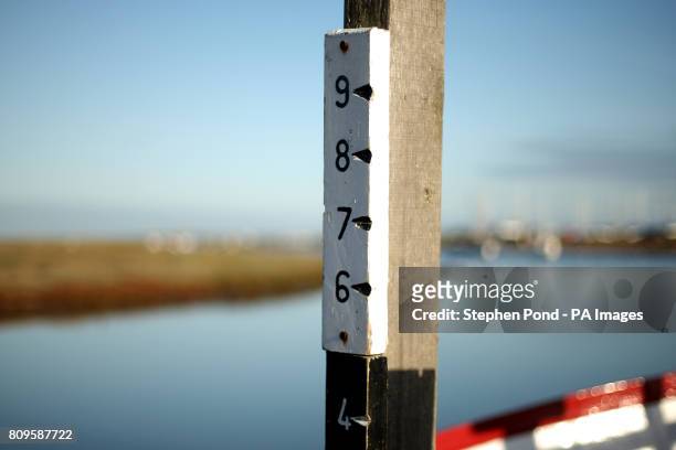 Depth gauge on the quayside in the small fishing port village of Blakeney on the North Norfolk Coast.
